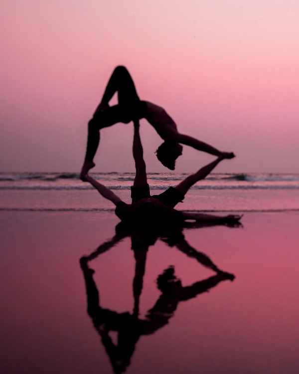 Couples AcroYoga at the Beach in Florida